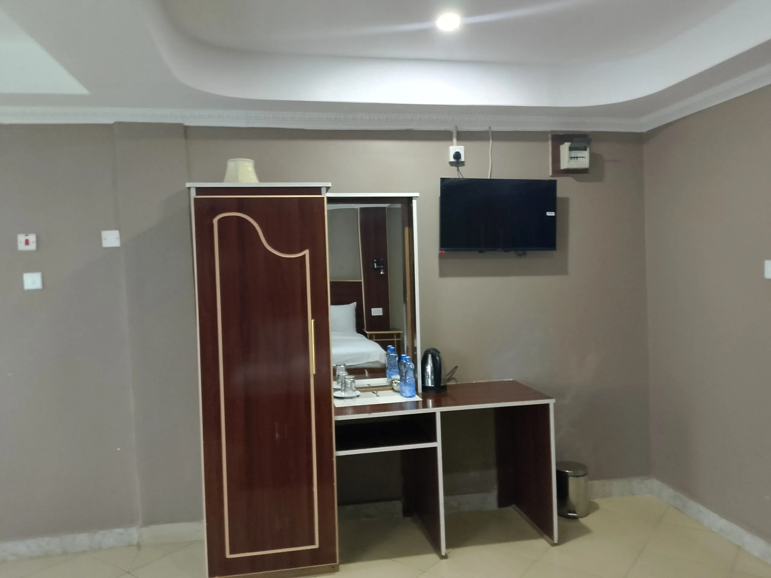 Dressing and vanity station in a guest room at Generis Hotel