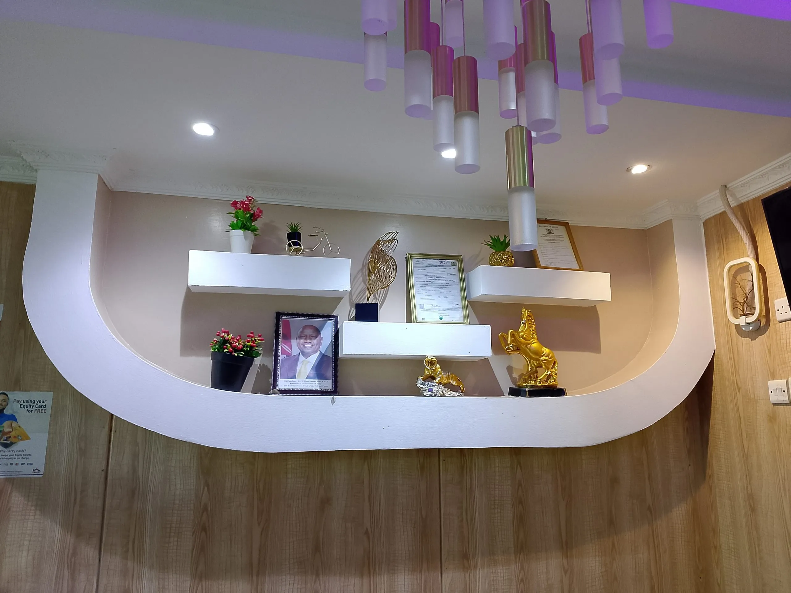 The reception desk and lobby seating at Generis Hotel