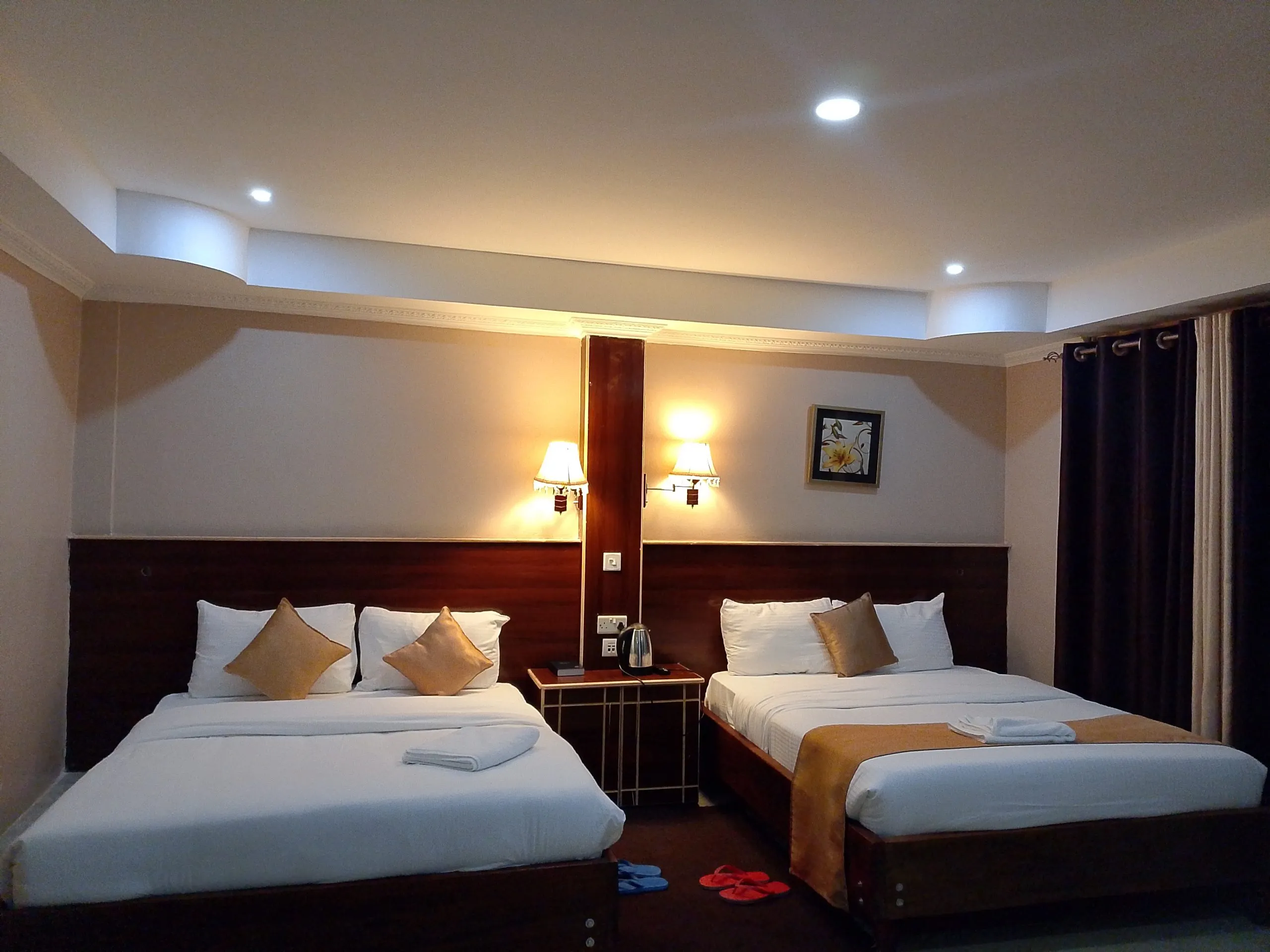 A twin room at Generis Hotel with two separate single beds